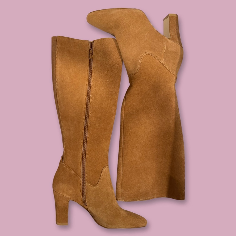 BRAND NEW NEVER WORN. HEELED BOOTS BY CORSO COMO